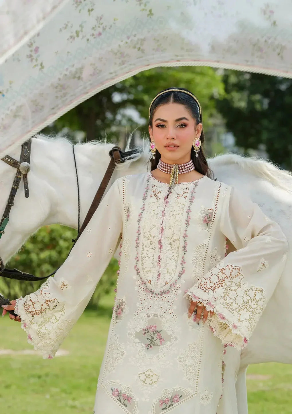Traditional Lawn Outfit in Half white color with very little coral tone.