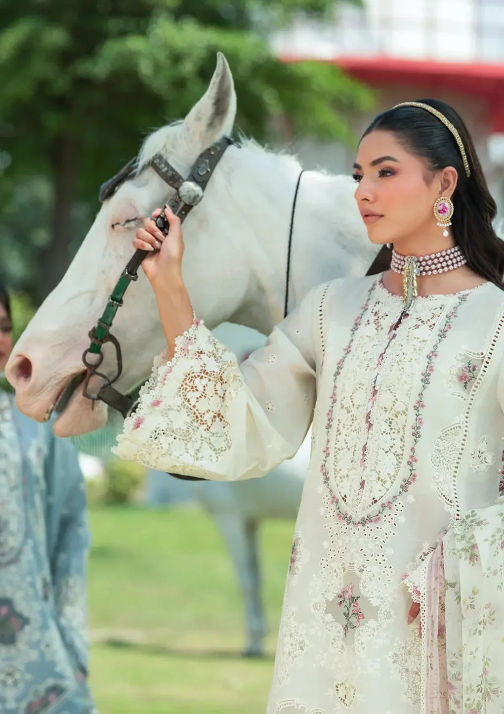 Traditional Lawn Outfit in Half white color with very little coral tone.