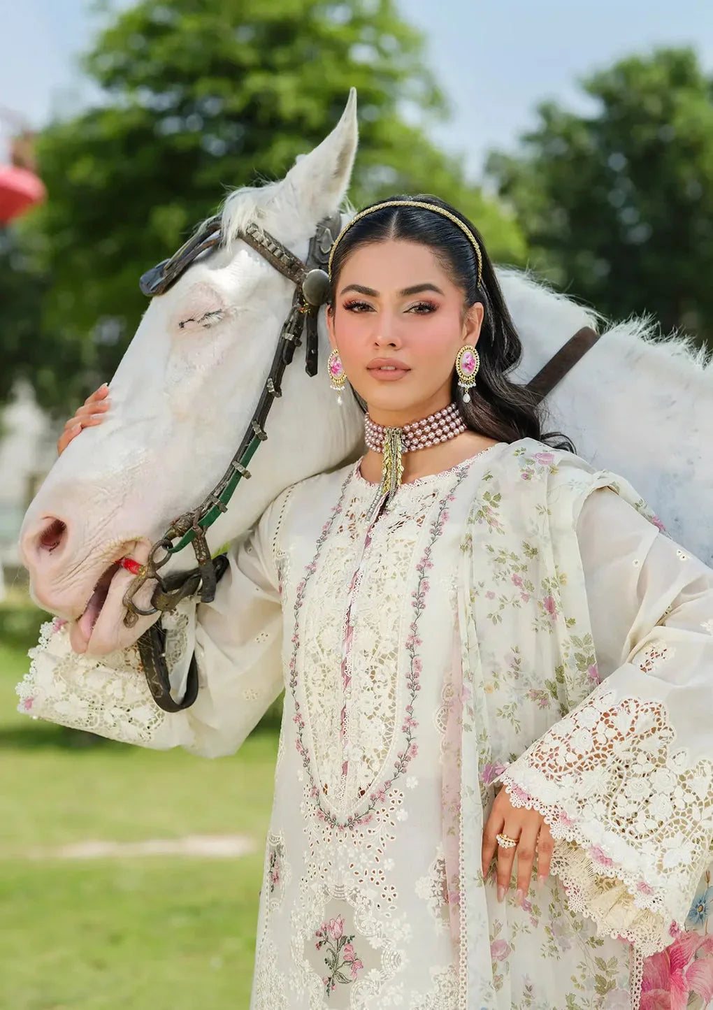 Traditional Lawn Outfit in Half white color with very little coral tone.